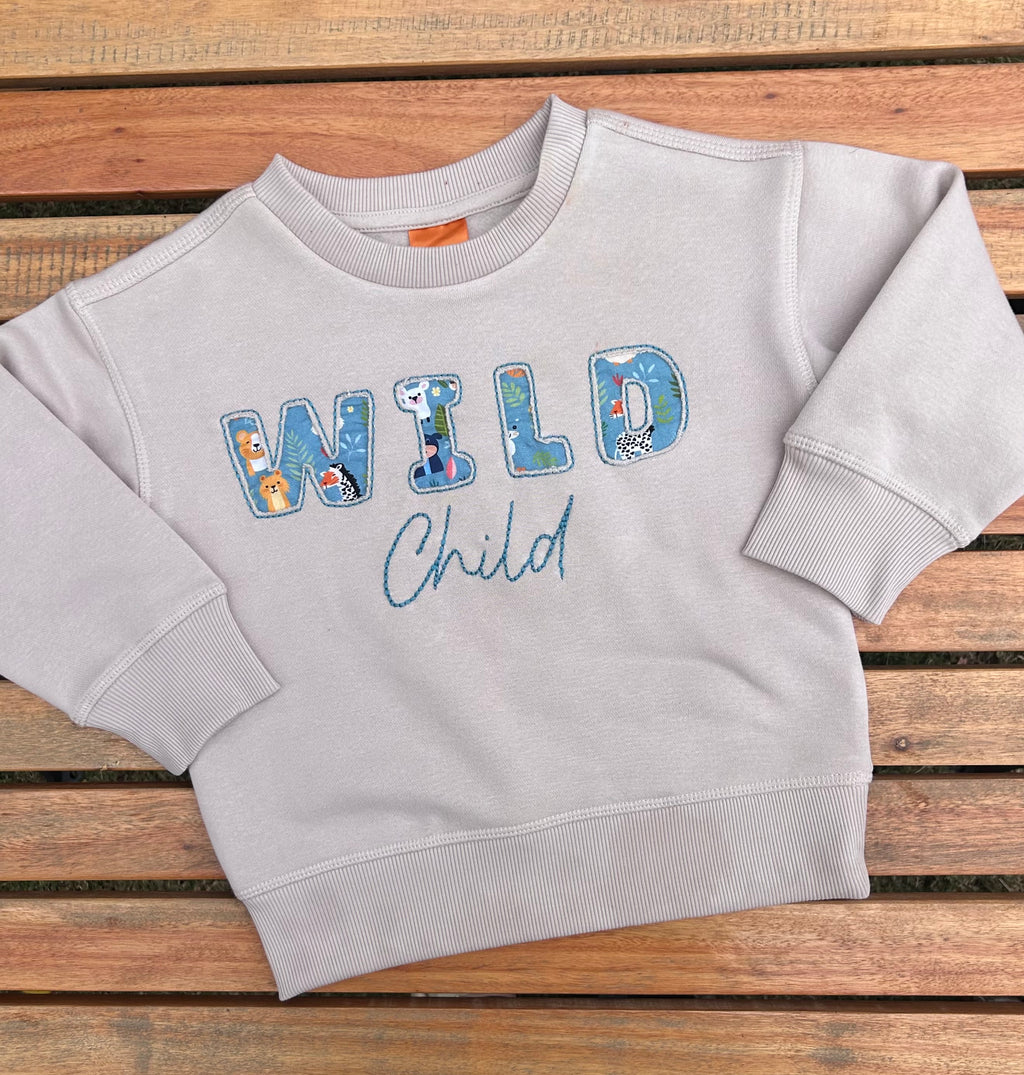 Wild Child Reverse Applique Embroidered Jumper