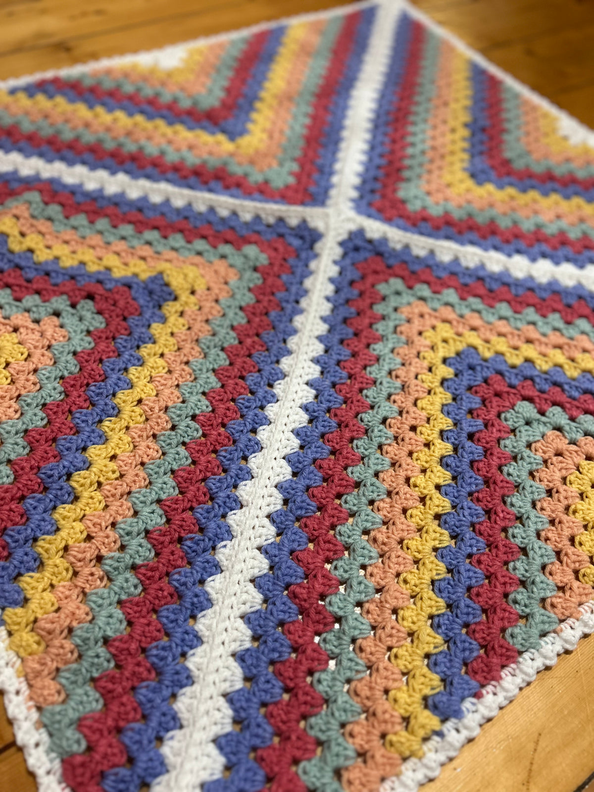 Daphne Afghan Crochet Baby Blanket - Rainbow (purple centre)